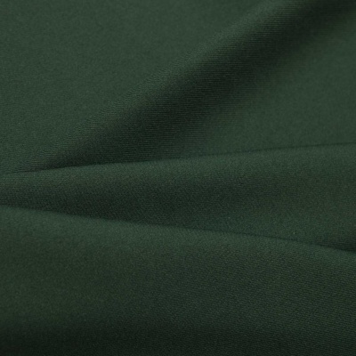 Ткань костюмная 21010 2076, 225 гр/м2, шир.150см, цвет т.зеленый - купить в Симферополе. Цена 390.73 руб.